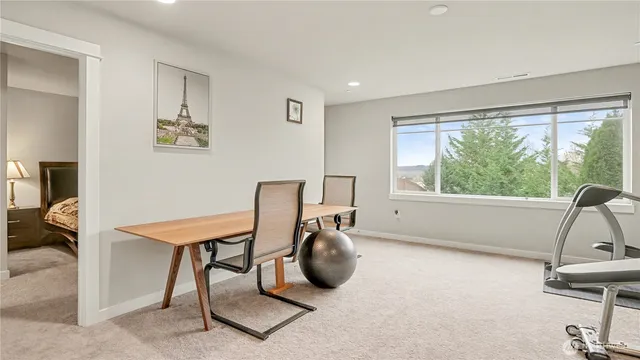 a workspace with furniture and a window