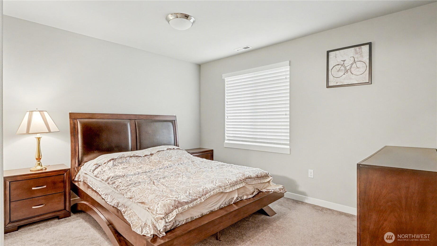 20403 93rd Place South, Unit 902 Kent, WA 98031 - Photo 17 of 40 a bedroom with a bed and window