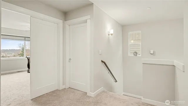 a view of a hallway with closet