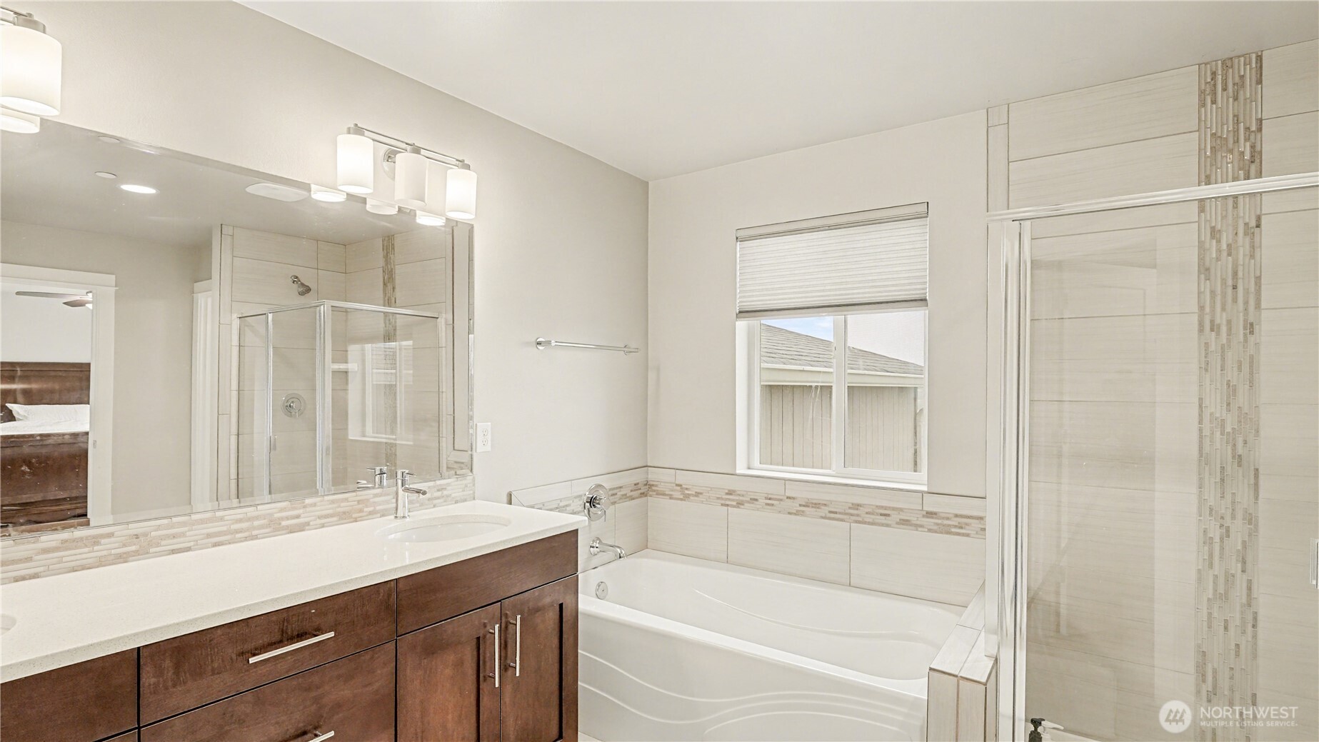 20403 93rd Place South, Unit 902 Kent, WA 98031 - Photo 26 of 40 a bathroom with a bathtub and a sink