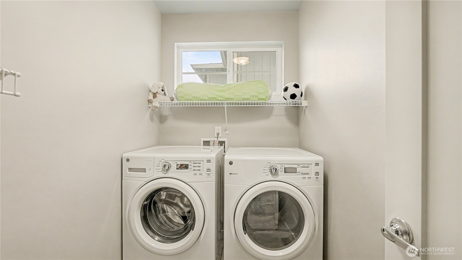 20403 93rd Place South, Unit 902 Kent, WA 98031 - Photo 31 of 40 a utility room with dryer and washer