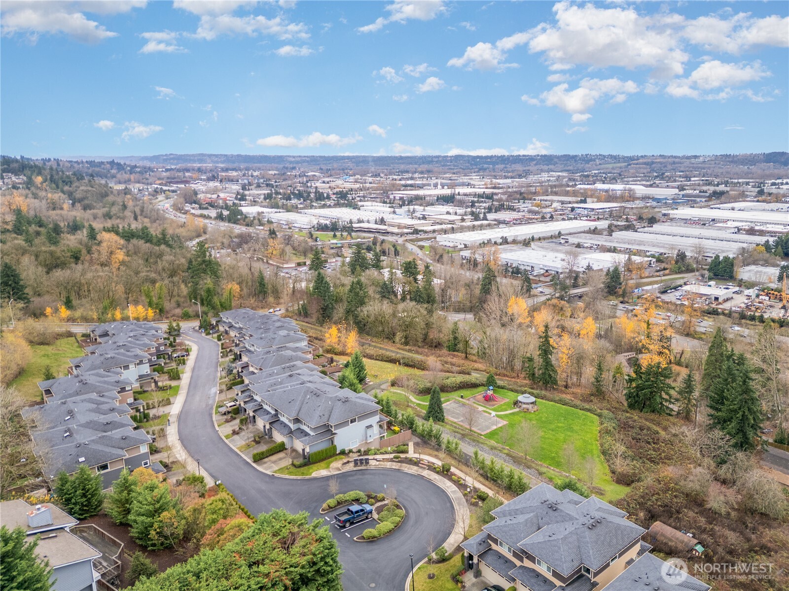 20403 93rd Place South, Unit 902 Kent, WA 98031 - Photo 39 of 40 an aerial view of a house with outdoor space