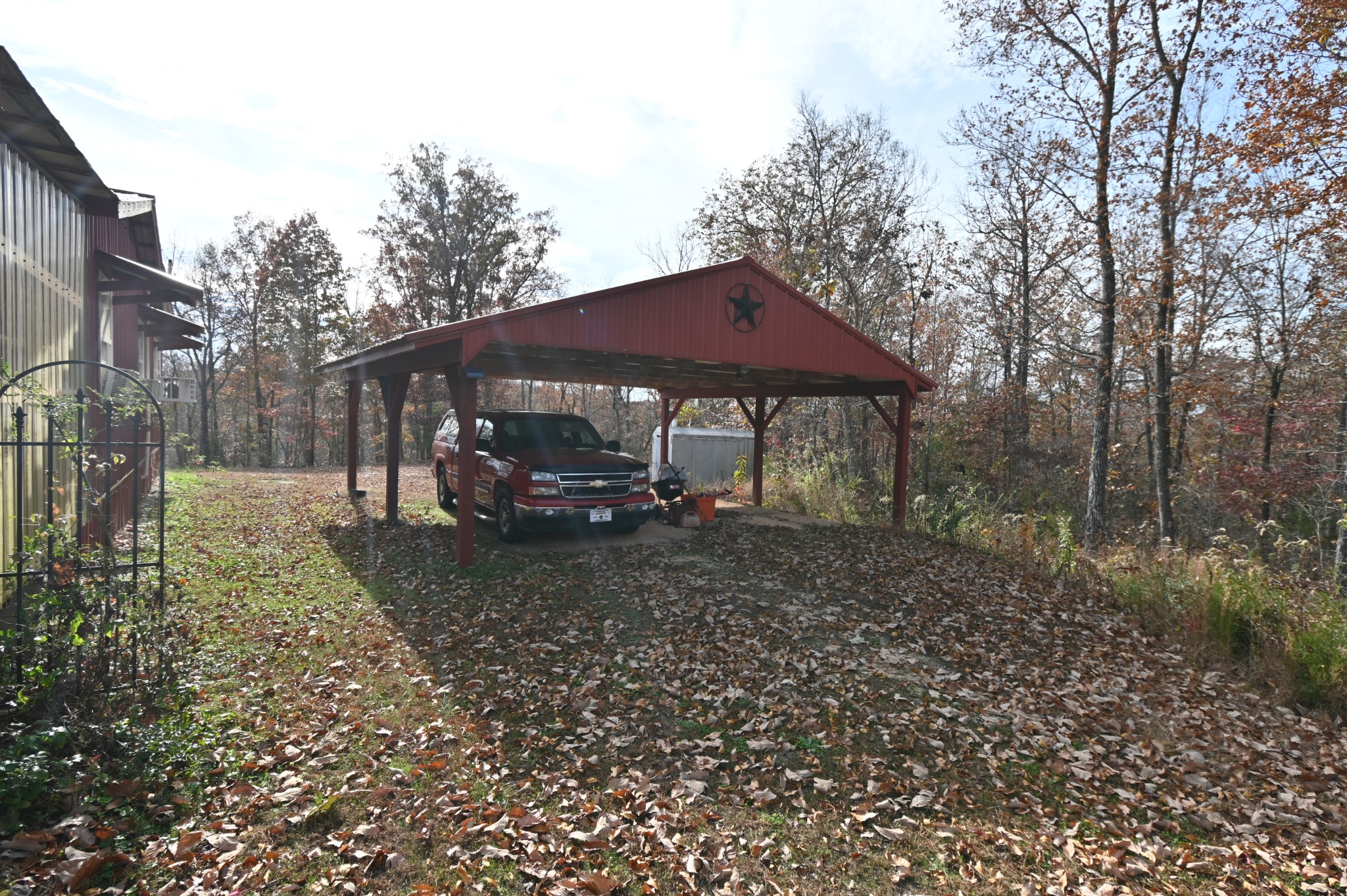 2383 Airport Ridge Road Linden, TN 37096 - Photo 11 of 64 a view of a house with backyard and trees