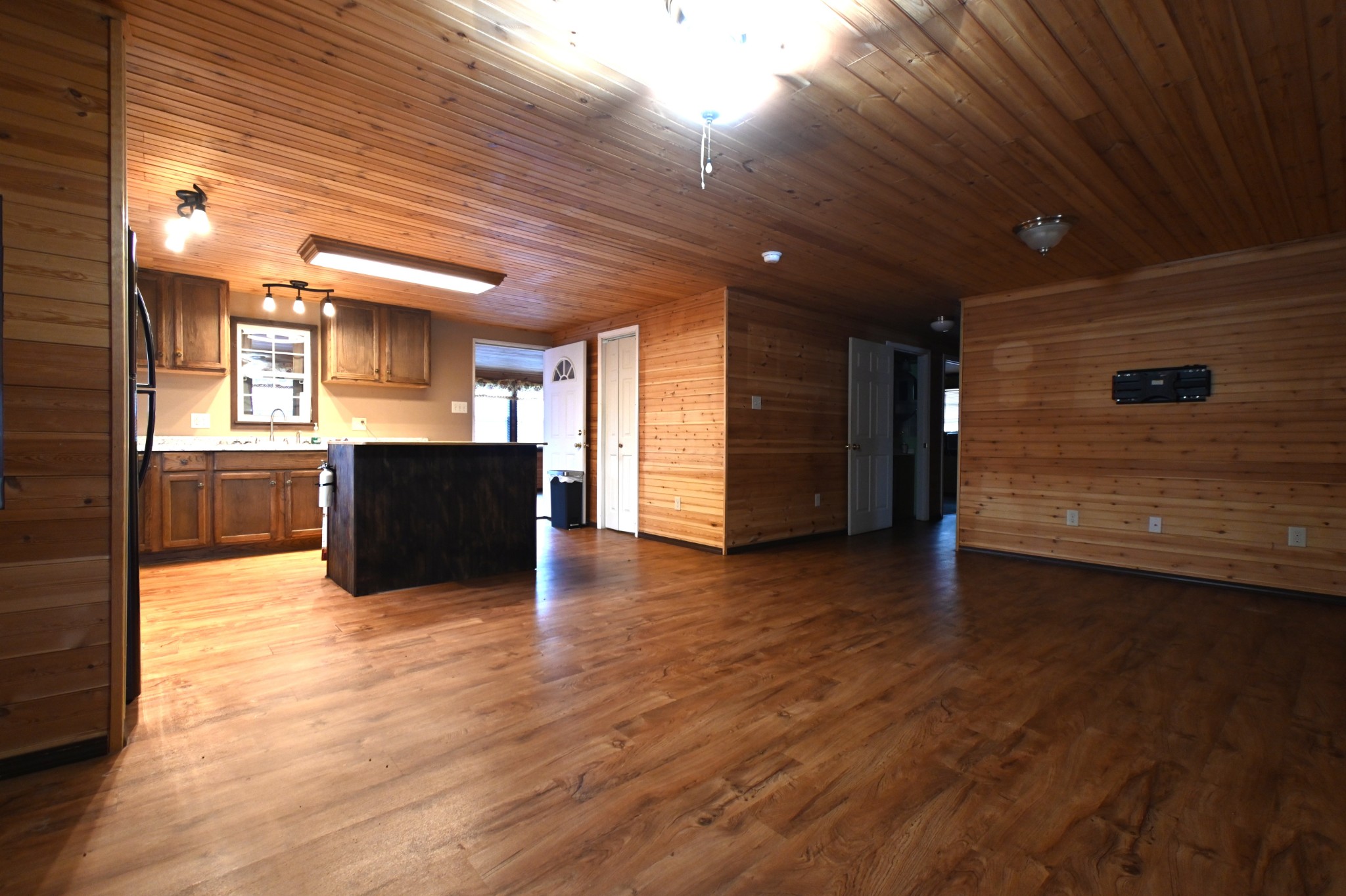 2383 Airport Ridge Road Linden, TN 37096 - Photo 45 of 64 a view of kitchen and hall with wooden floor