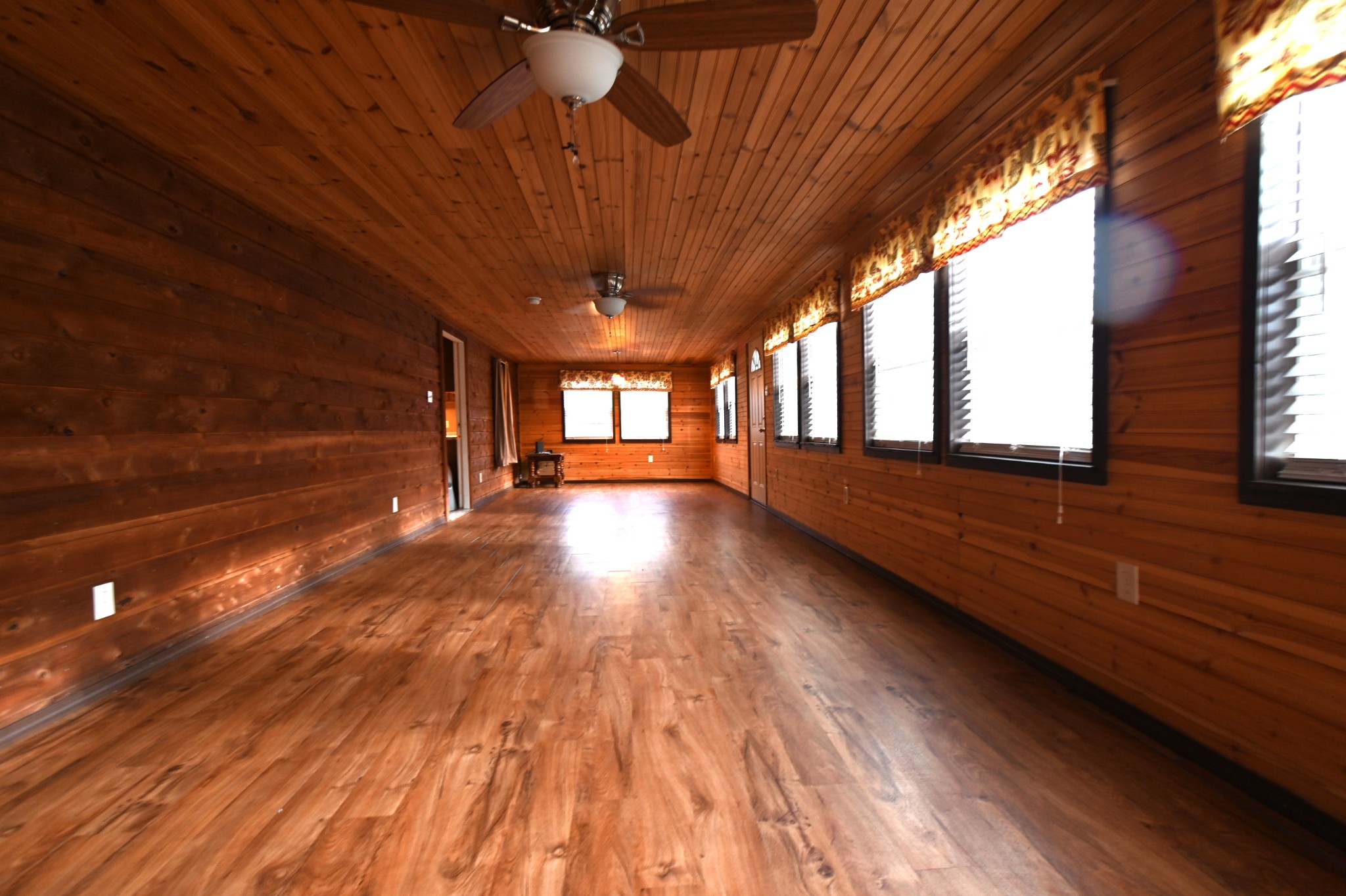 2383 Airport Ridge Road Linden, TN 37096 - Photo 49 of 64 a view of an empty room with wooden floor and a window