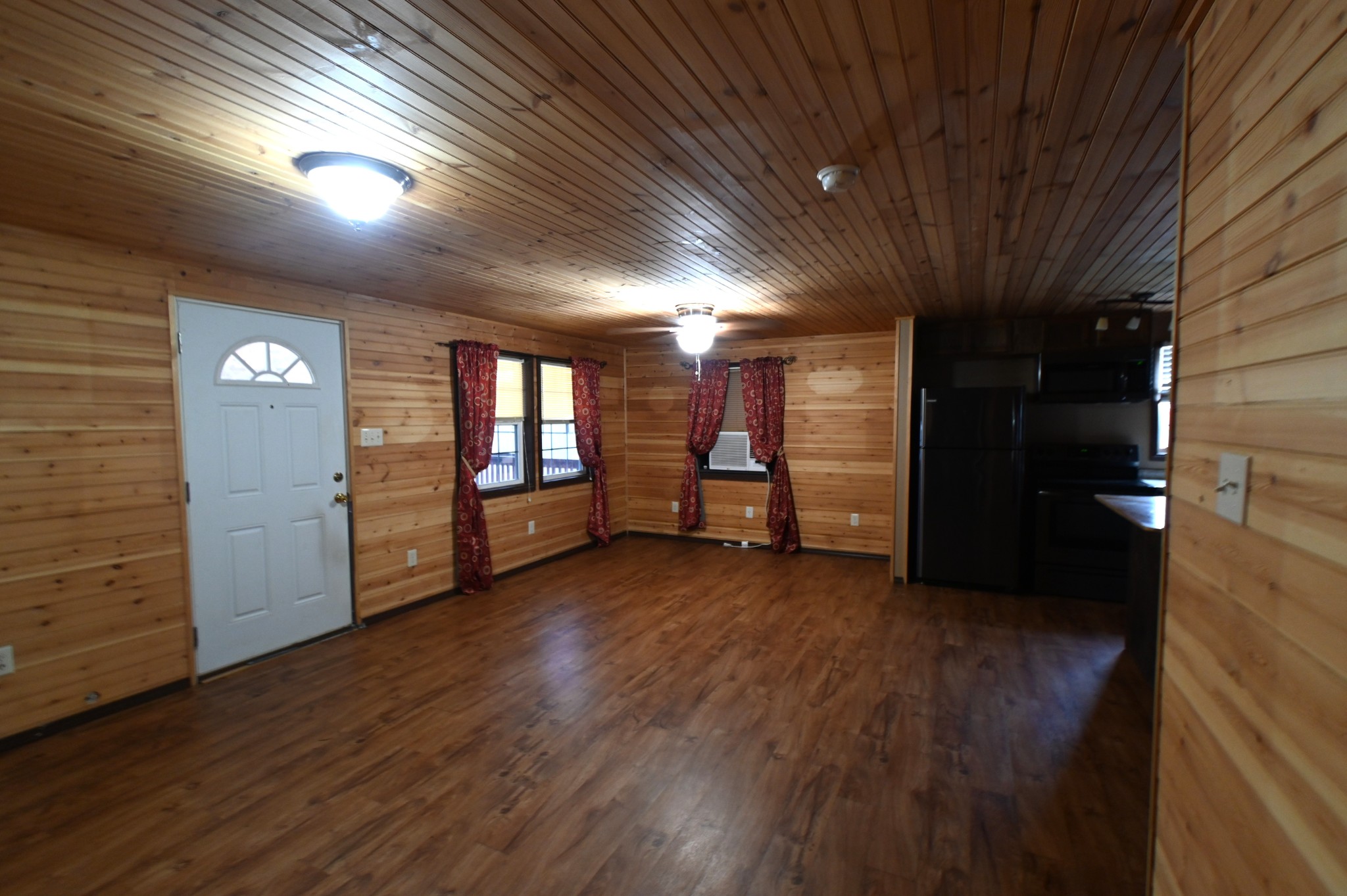 2383 Airport Ridge Road Linden, TN 37096 - Photo 57 of 64 an empty room with wooden floor and windows