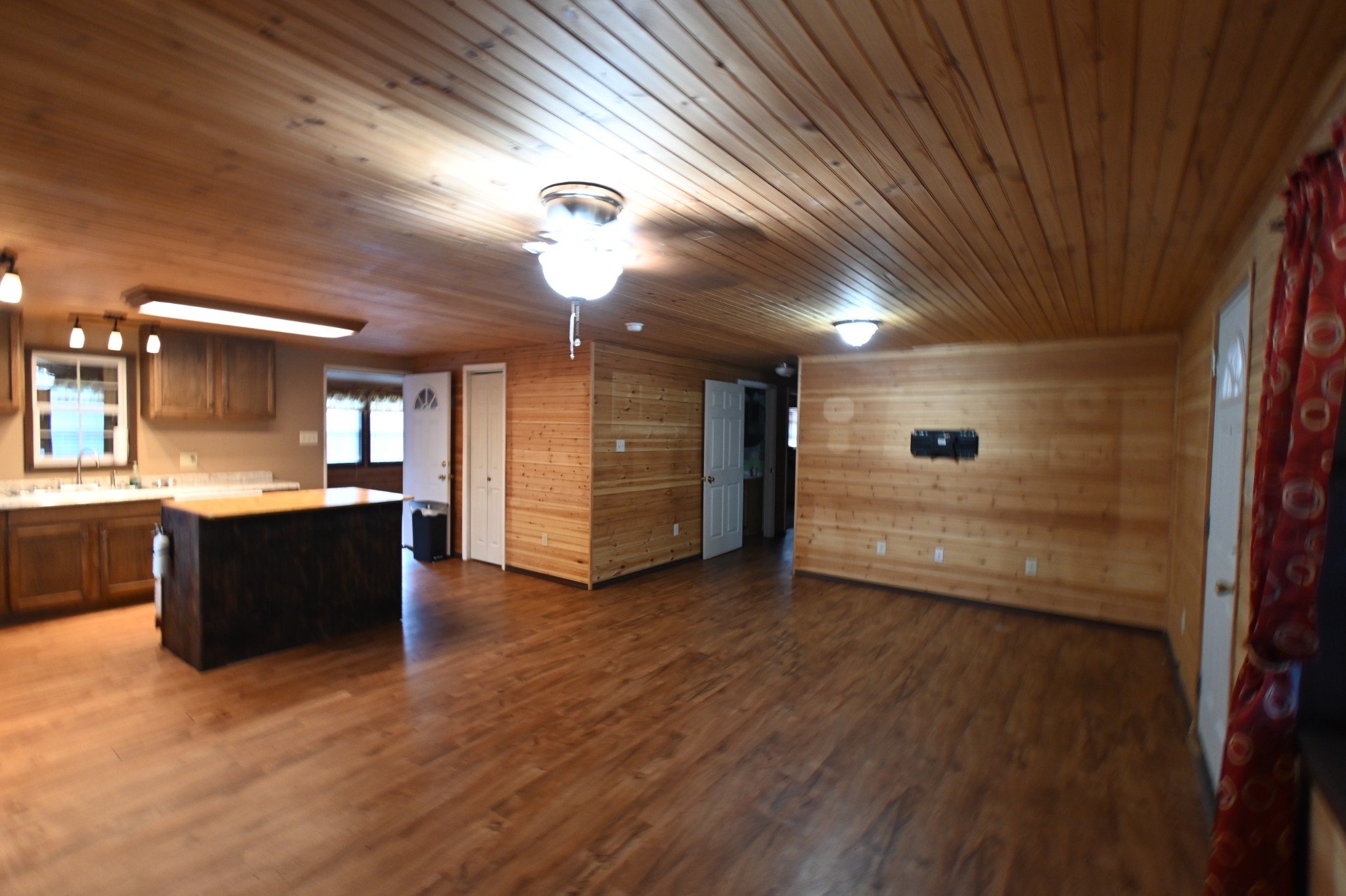 2383 Airport Ridge Road Linden, TN 37096 - Photo 60 of 64 a view of a big room with wooden floor and windows