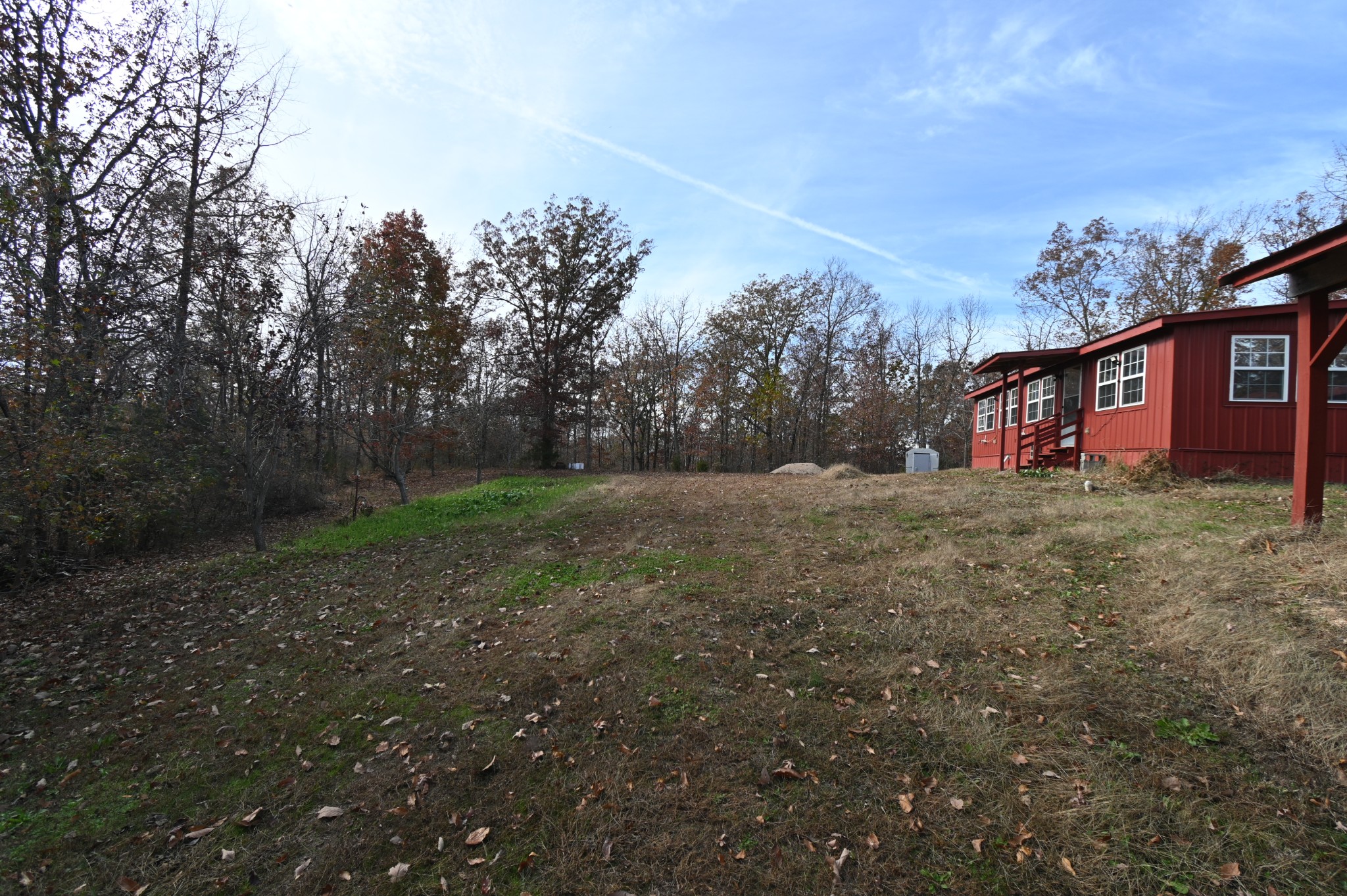 2383 Airport Ridge Road Linden, TN 37096 - Photo 8 of 64 a view of a house with a yard