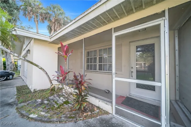 a view of a entryway door front of house