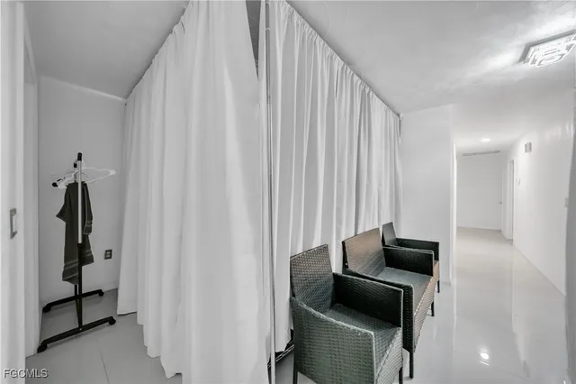 a hallway with a couch and a couch