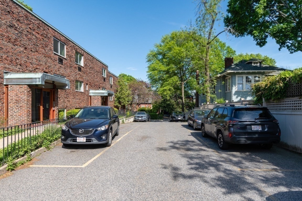 57 St Paul Street, Unit 19 Brookline, MA 02446 - Photo 16 of 23 a car parked in front of a building