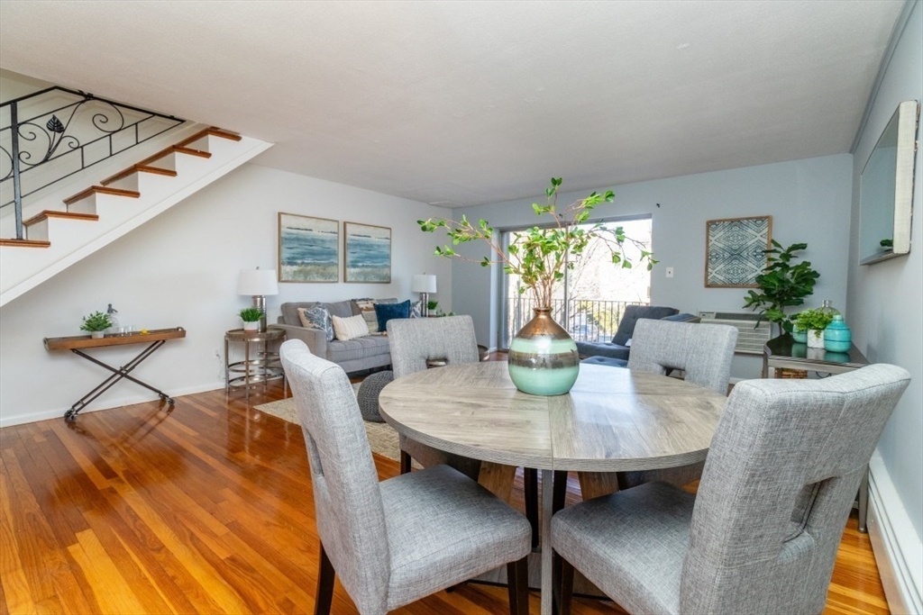 57 St Paul Street, Unit 19 Brookline, MA 02446 - Photo 5 of 23 a view of a dining room with furniture