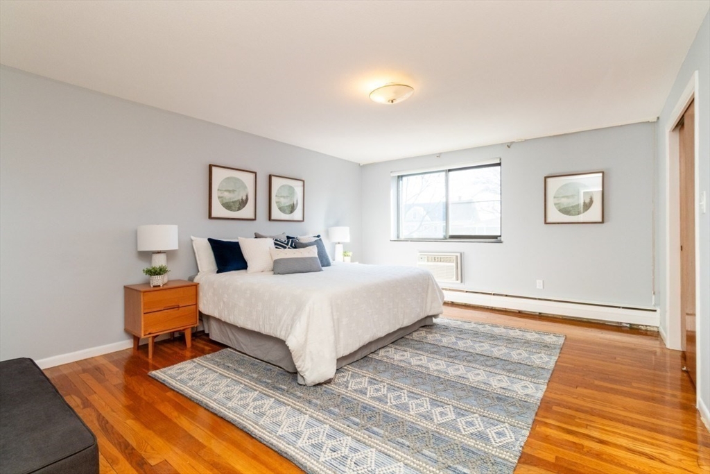 57 St Paul Street, Unit 19 Brookline, MA 02446 - Photo 10 of 23 a room with a bed and a window