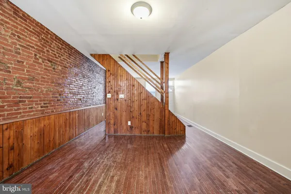 a view of entryway with wooden floor