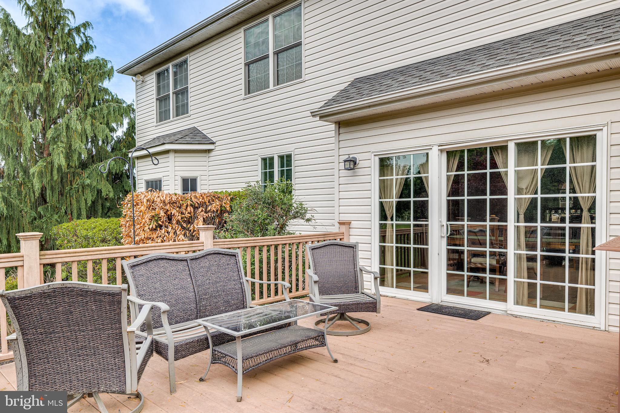 2 Dellaira Court Wrightstown, NJ 08562 - Photo 67 of 93 a view of a chair and tables in the back yard of the house