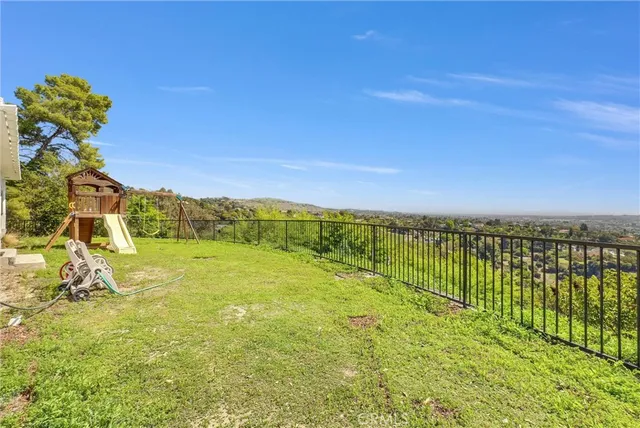 a view of a swimming pool with an outdoor seating