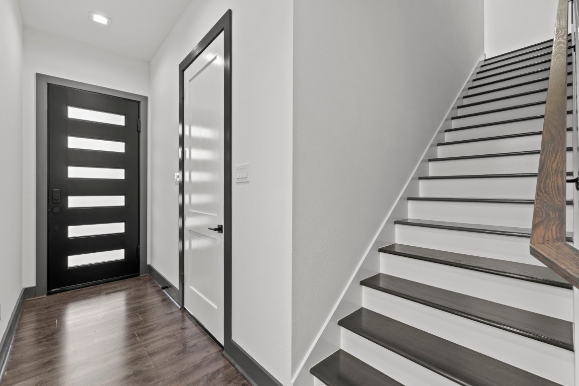 3118 Clay Street Houston, TX 77003 - Photo 4 of 32 a view of a hallway with wooden floor and entryway