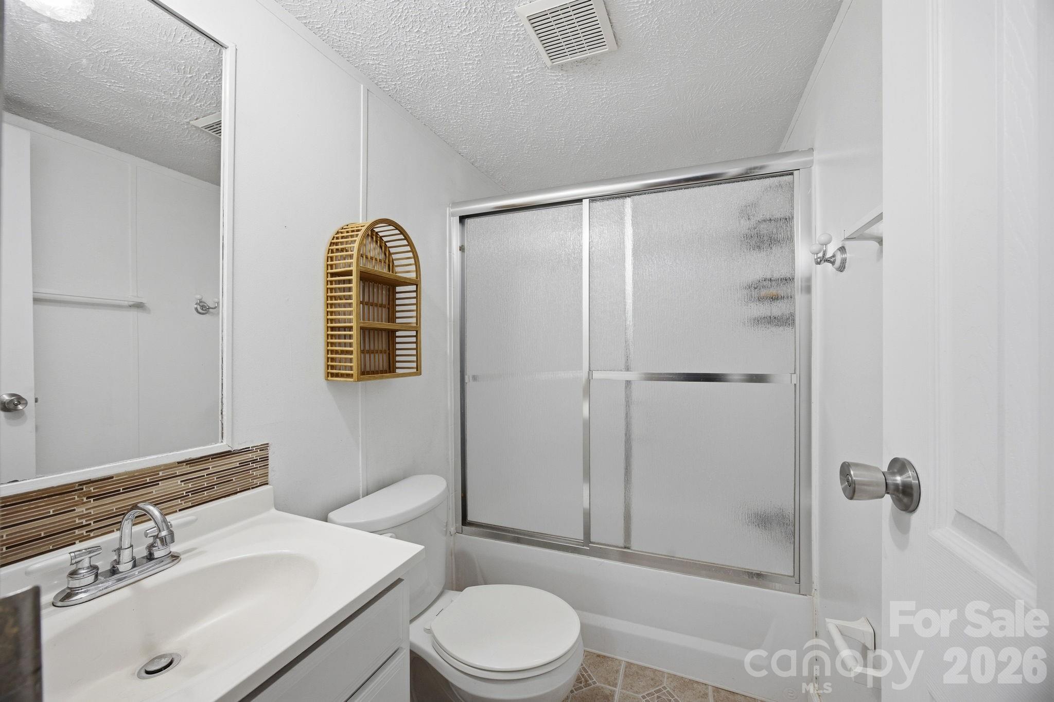 675 Overcash Road Salisbury, NC 28147 - Photo 29 of 48 a bathroom with a sink toilet and shower