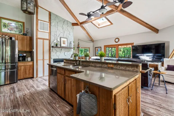 a living room with furniture and a table