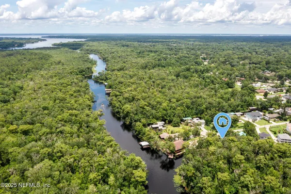 a view of a street with lots of trees