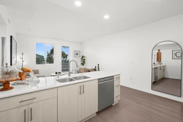 a bathroom with a double vanity sink and mirror