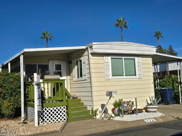 a front view of a house with a porch