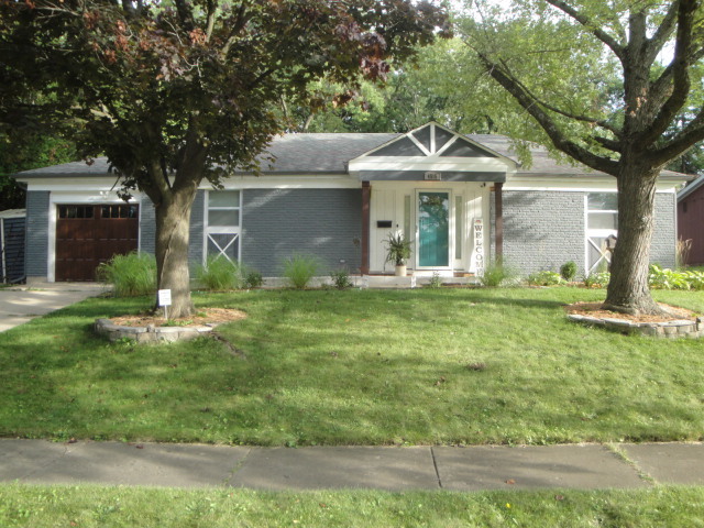 4515 Ashley Drive McHenry, IL 60050 - Photo 1 of 28 a front view of a house with garden