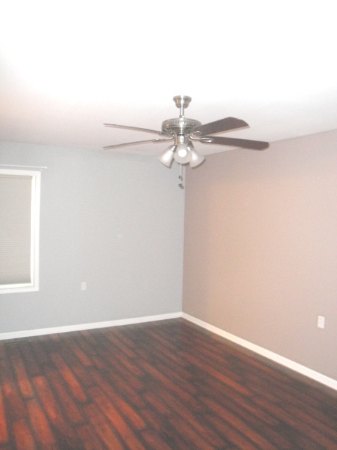 4515 Ashley Drive McHenry, IL 60050 - Photo 11 of 28 a view of a room with wooden floor
