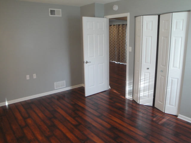 4515 Ashley Drive McHenry, IL 60050 - Photo 21 of 28 a view of an empty room with wooden floor