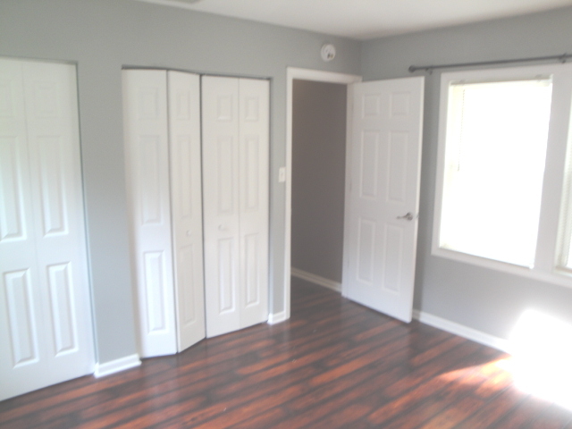 4515 Ashley Drive McHenry, IL 60050 - Photo 25 of 28 a view of an empty room with wooden floor
