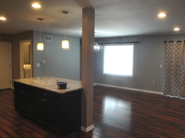 4515 Ashley Drive McHenry, IL 60050 - Photo 4 of 28 a bathroom with a sink shower and a mirror