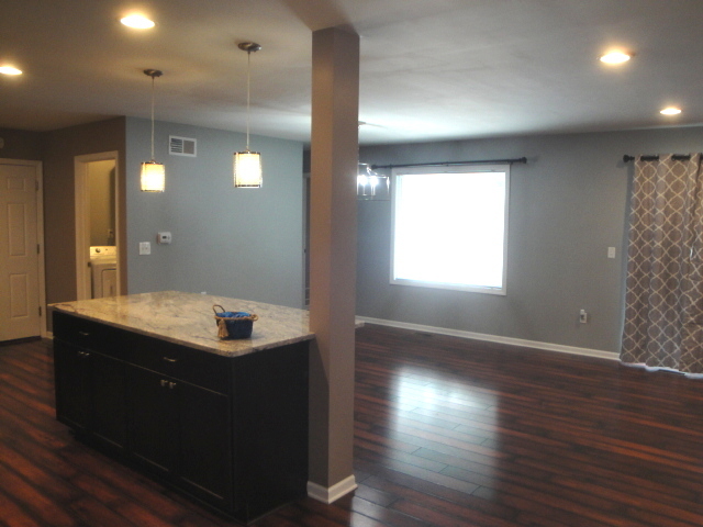 4515 Ashley Drive McHenry, IL 60050 - Photo 5 of 28 a bathroom with a sink shower and a mirror