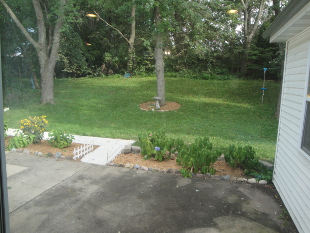 4515 Ashley Drive McHenry, IL 60050 - Photo 9 of 28 a view of a park with large trees