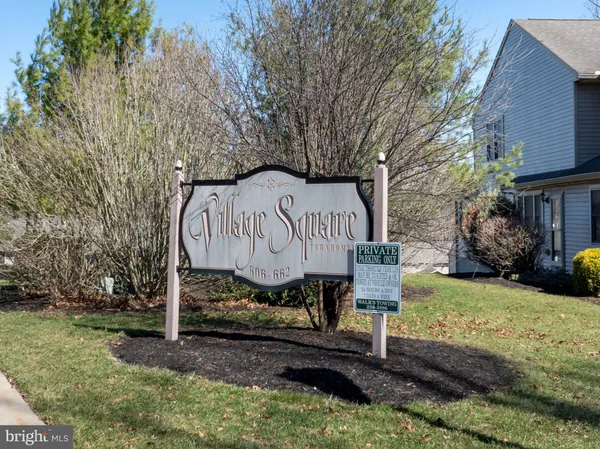a view of a bench in a park