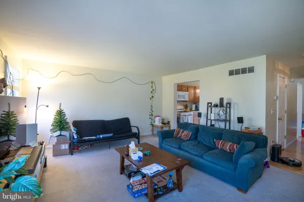 a living room with furniture and a couch