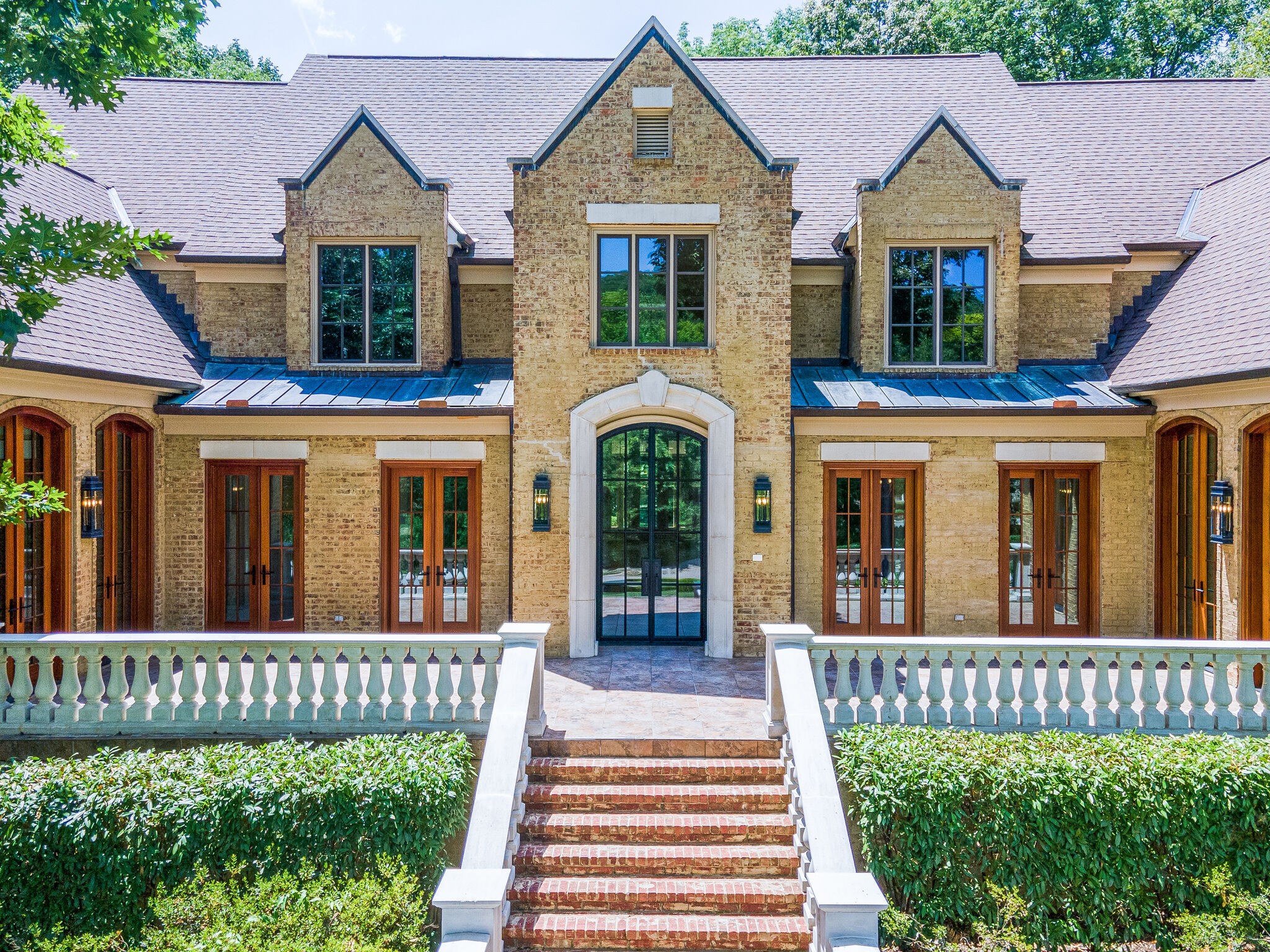 1073 Vaughn Crest Boulevard Franklin, TN 37069 - Photo 2 of 70 a front view of a house with a yard