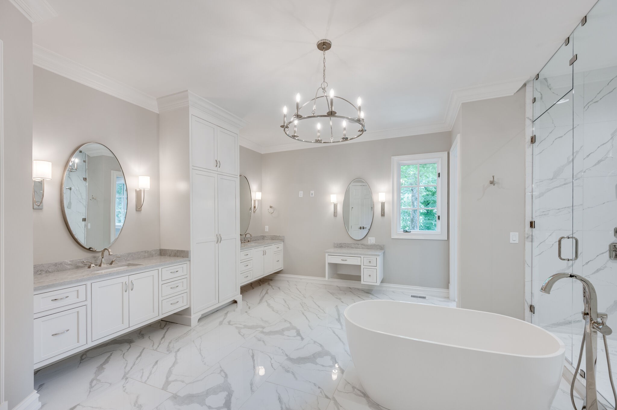 1073 Vaughn Crest Boulevard Franklin, TN 37069 - Photo 22 of 70 a spacious bathroom with a double vanity sink mirror and bathtub