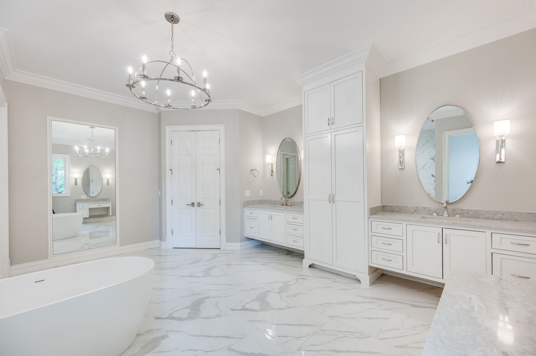 1073 Vaughn Crest Boulevard Franklin, TN 37069 - Photo 24 of 70 a spacious bathroom with a double vanity sink a mirror and a bathtub