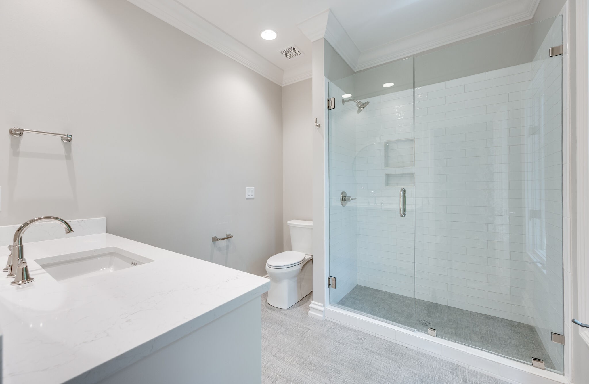 1073 Vaughn Crest Boulevard Franklin, TN 37069 - Photo 36 of 70 a bathroom with a granite countertop sink a toilet and shower