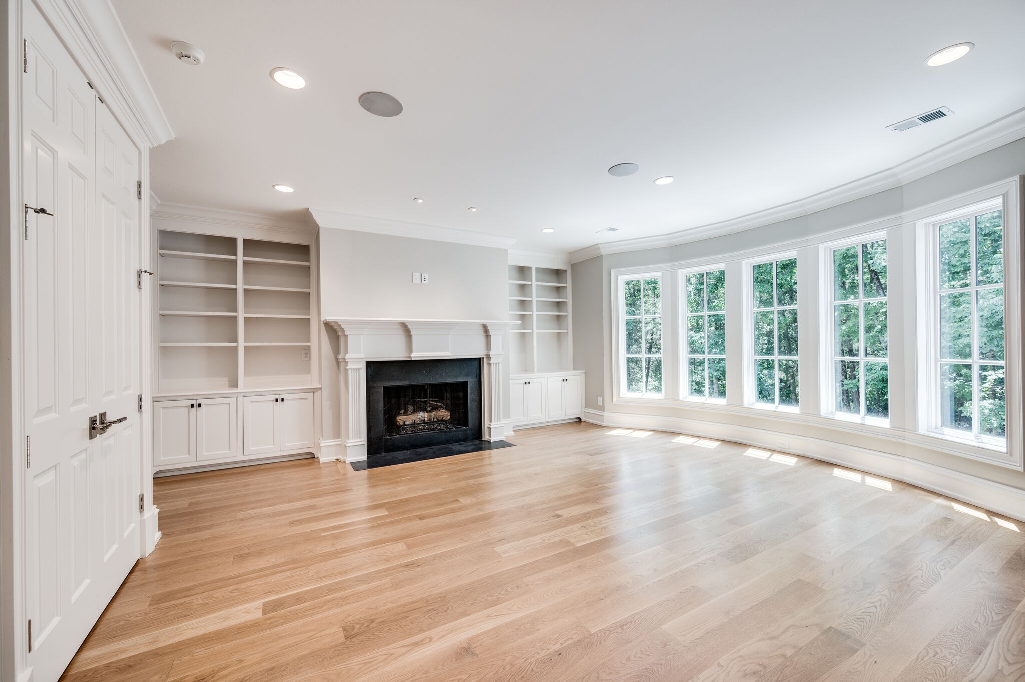 1073 Vaughn Crest Boulevard Franklin, TN 37069 - Photo 39 of 70 a view of an empty room with a window and fireplace