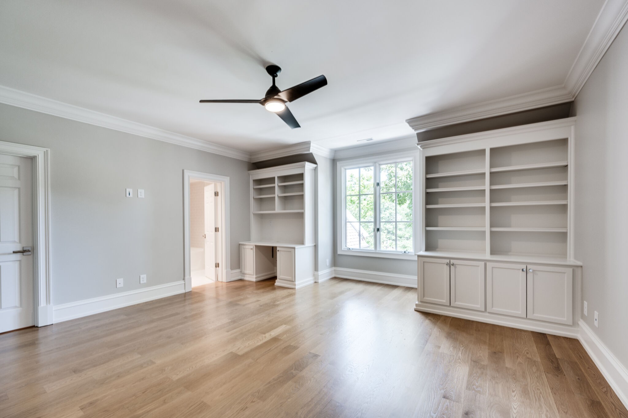 1073 Vaughn Crest Boulevard Franklin, TN 37069 - Photo 40 of 70 a view of empty room with wooden floor and window