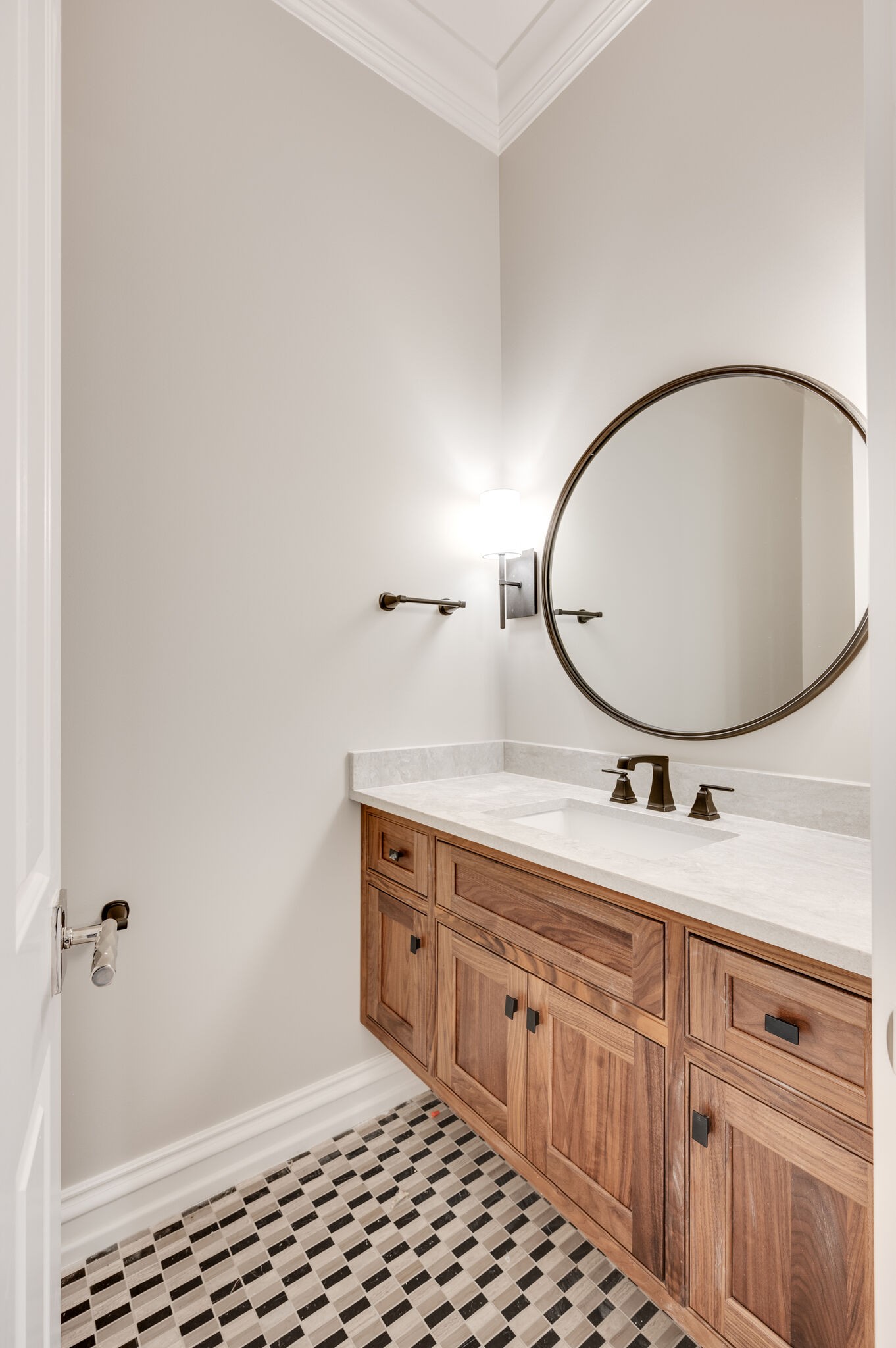 1073 Vaughn Crest Boulevard Franklin, TN 37069 - Photo 47 of 70 a bathroom with a sink a mirror and a vanity