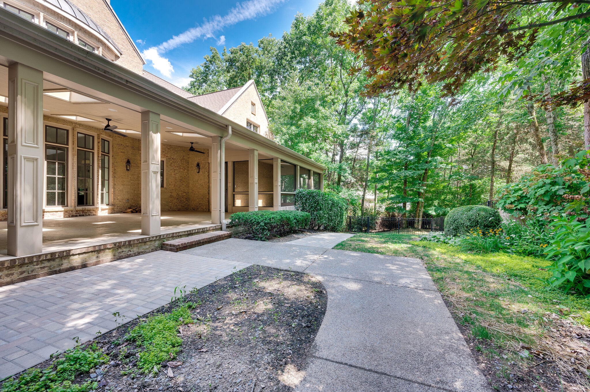 1073 Vaughn Crest Boulevard Franklin, TN 37069 - Photo 60 of 70 a view of a house with backyard and garden