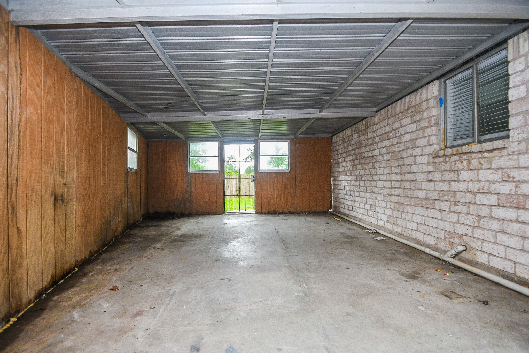 710 Barnesville Street Channelview, TX 77530 - Photo 20 of 20 Side storage attached to the home.