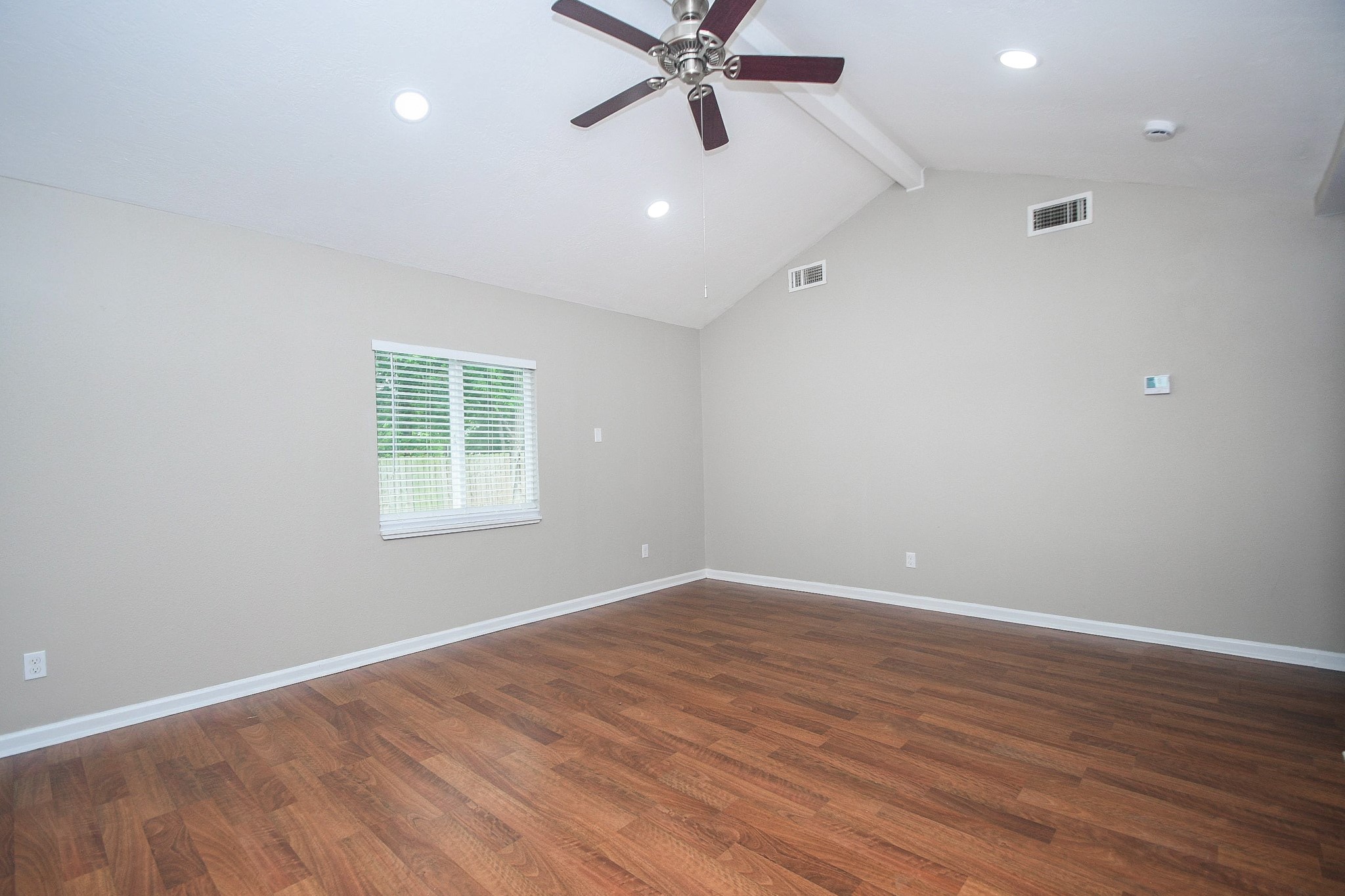 710 Barnesville Street Channelview, TX 77530 - Photo 5 of 20 Recessed lighting and ceiling fan in this spacious living room.