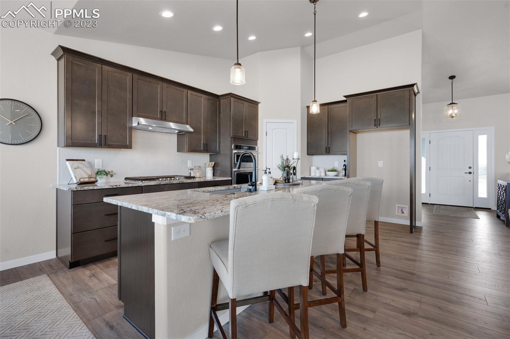 2970 Hoofprint Road Peyton, CO 80831 - Photo 17 of 42 Kitchen Looking To Entry