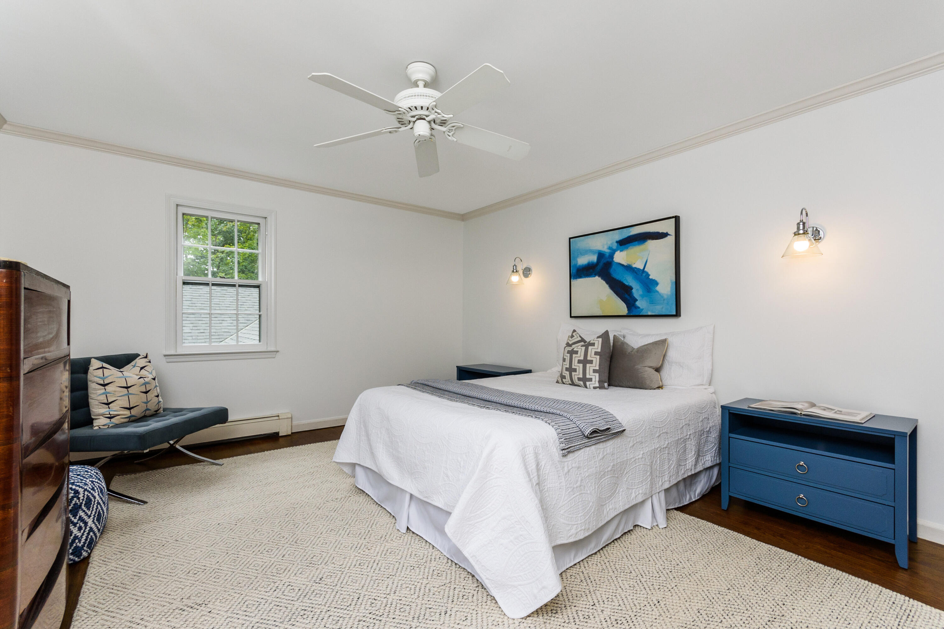 2 Hedge Row Darien, CT 06820 - Photo 19 of 38 a bedroom with a bed and a chandelier