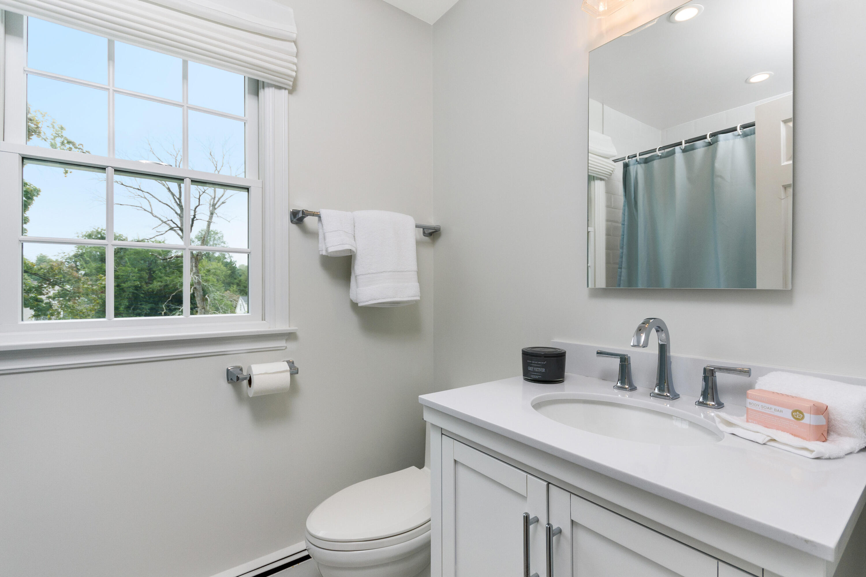 2 Hedge Row Darien, CT 06820 - Photo 22 of 38 a bathroom with a sink a toilet and a window