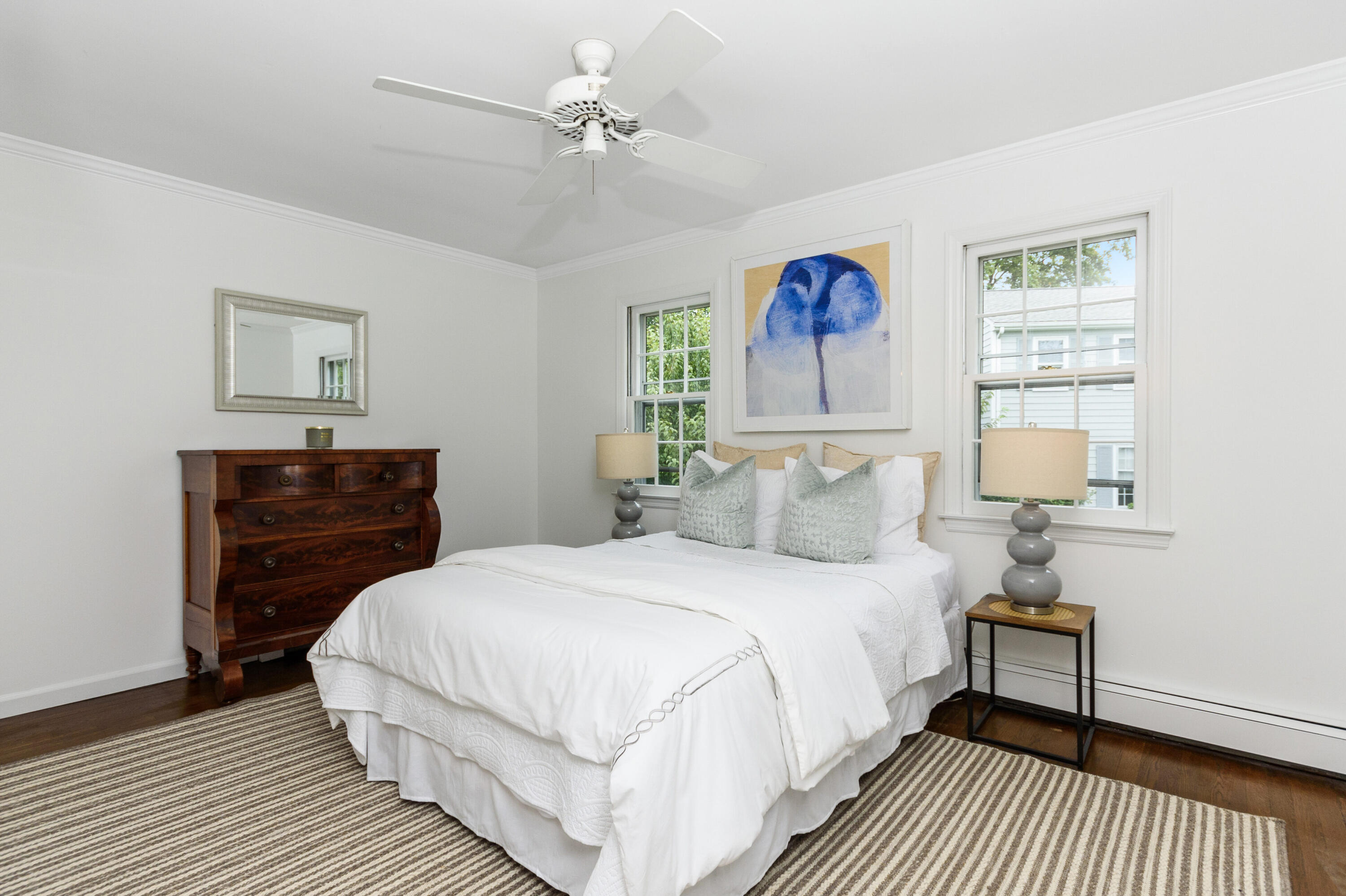 2 Hedge Row Darien, CT 06820 - Photo 23 of 38 a bedroom with a bed and a chandelier