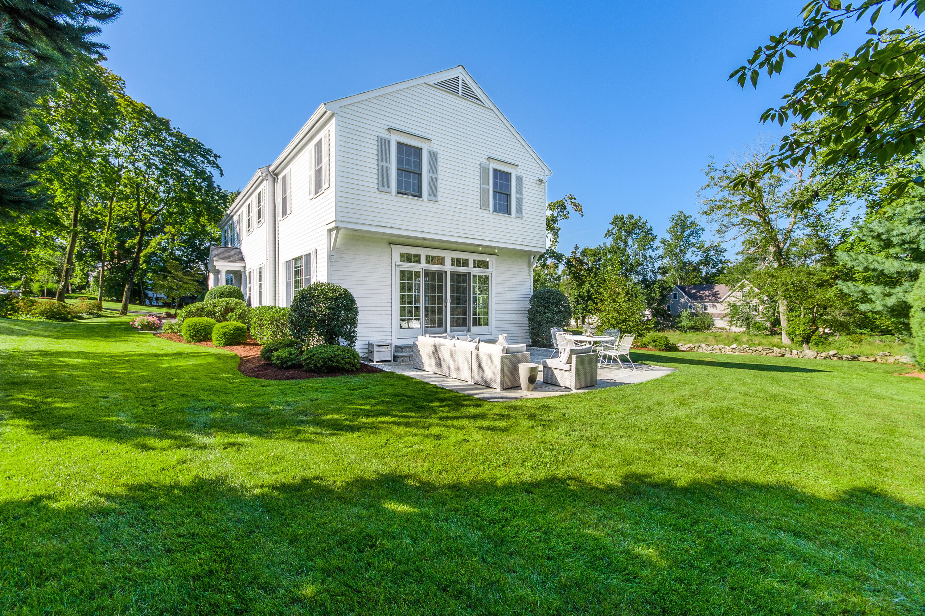 2 Hedge Row Darien, CT 06820 - Photo 27 of 38 a view of a house with a yard and sitting area